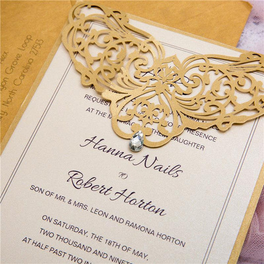 gold laser cut wedding invitation
